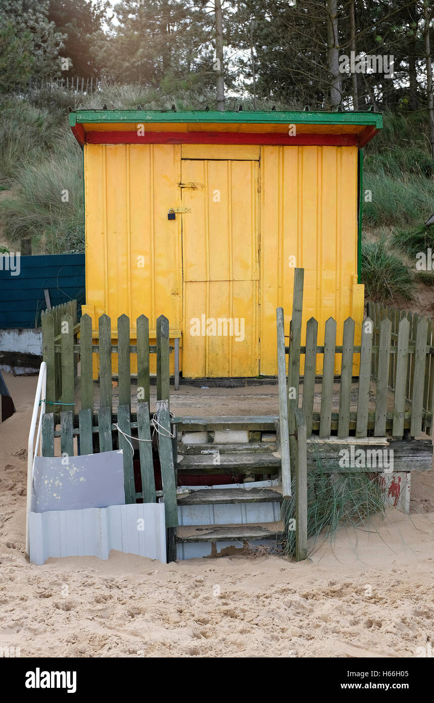 beach hut made from old metal shipping container Stock Photo