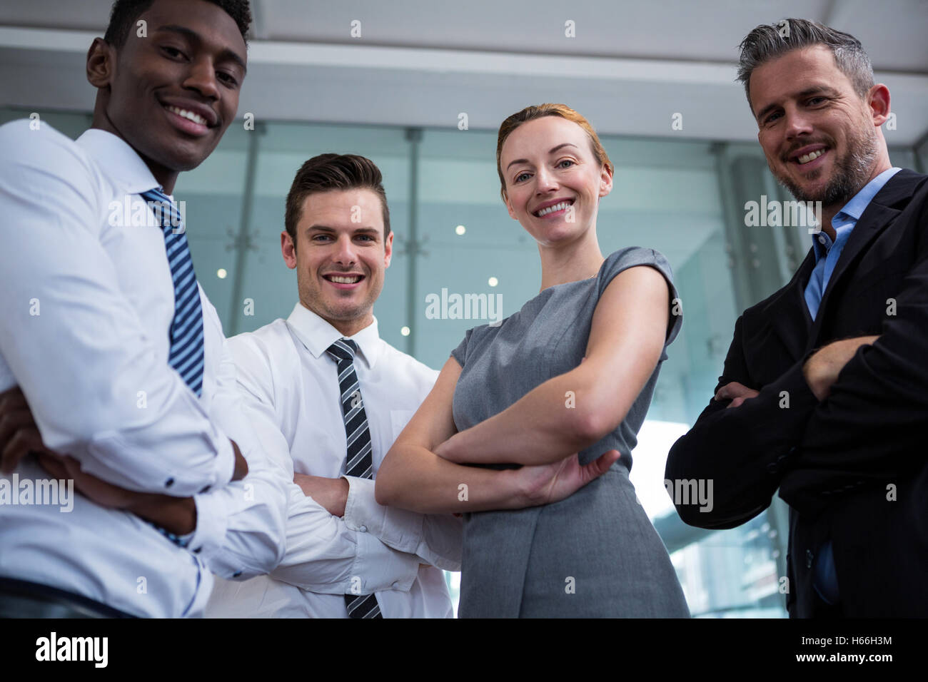 Portrait of businesspeople standing in office Stock Photo