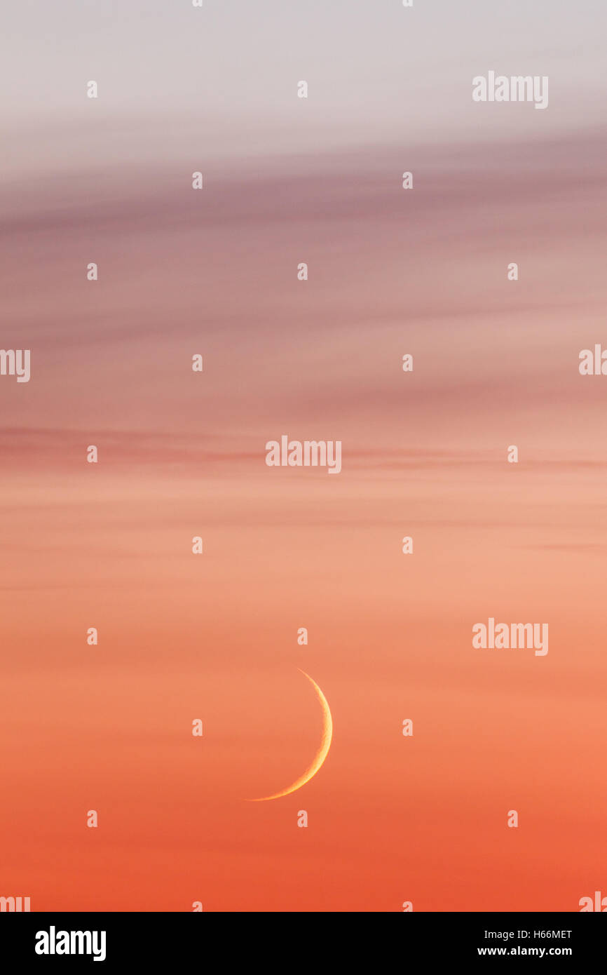 Moon crescent and pastel colors sunset sky Stock Photo - Alamy