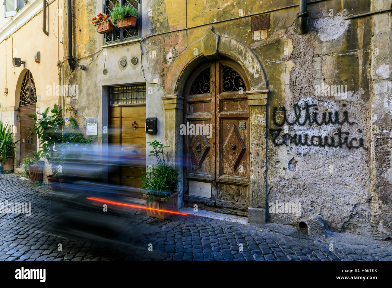 Cobblestone street in Trastevere district, Rome, Lazio, Italy Stock Photo