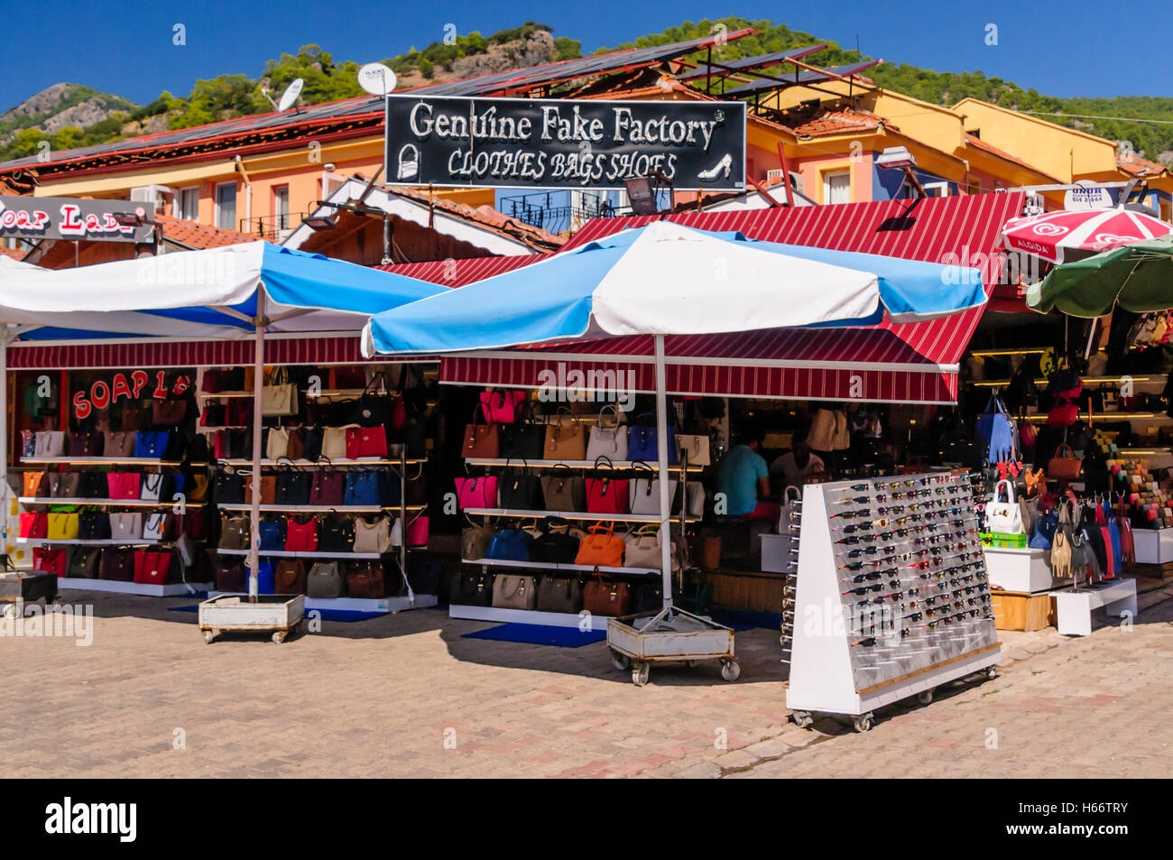Sign in a Turkish town called 'Genuine Fake Factory' selling counterfeit clothese, bags and shoes. Stock Photo