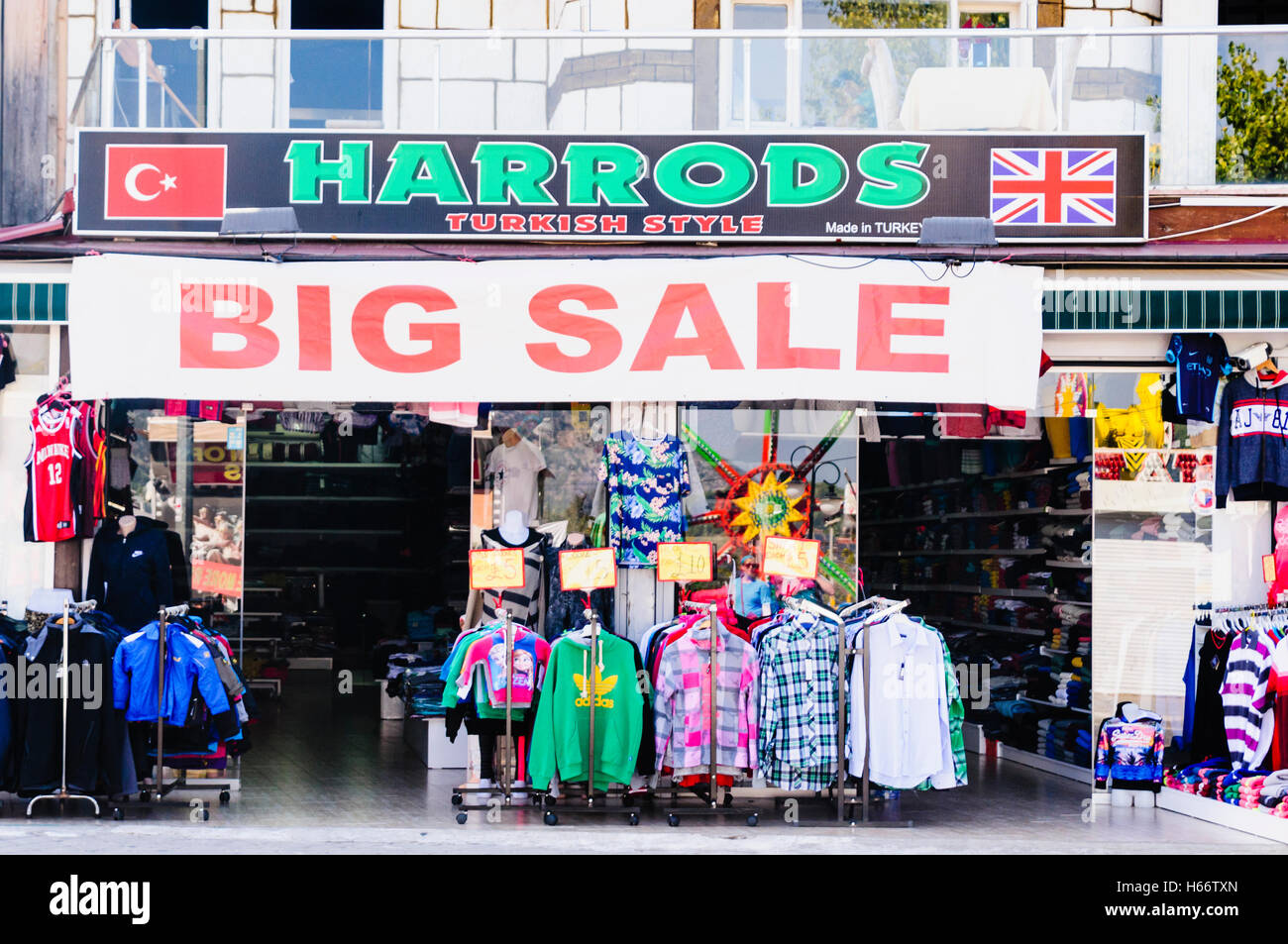 Shop in Turkey called "Harrods" selling counterfeit clothing, sportswear  and handbags, with sign saying "Big Sale Stock Photo - Alamy