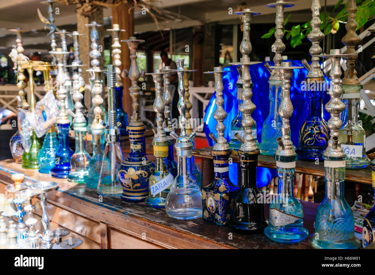Shisha pipes on a shelf in the Hookah Lounge of a Turkish restaurant