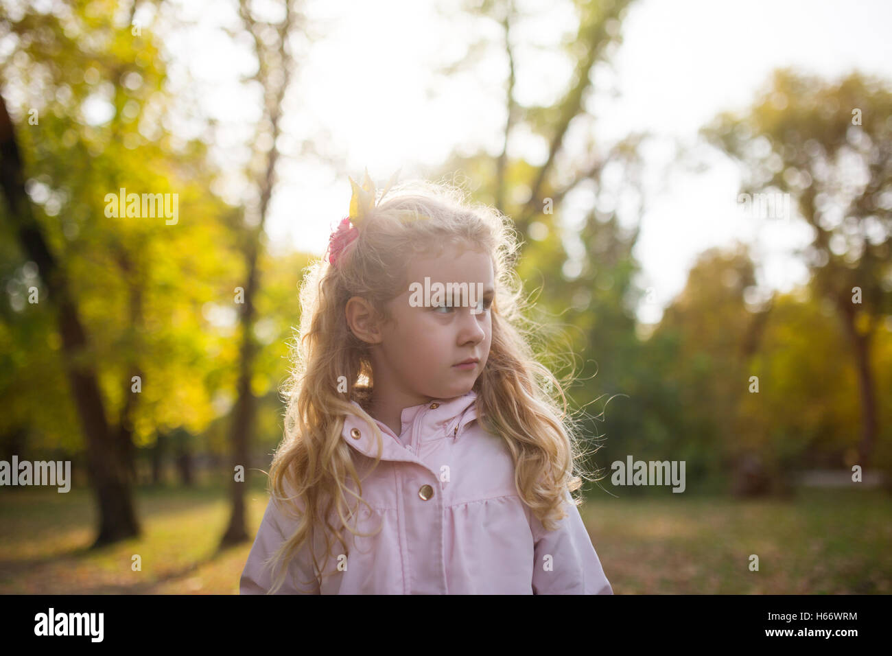 Autumn portrait of cute blonde girl Stock Photo - Alamy