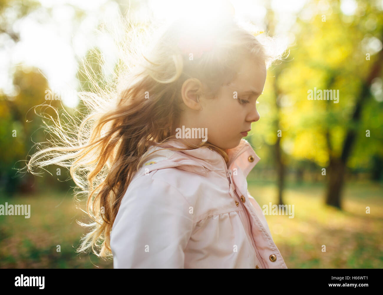 Autumn portrait of cute blonde girl Stock Photo