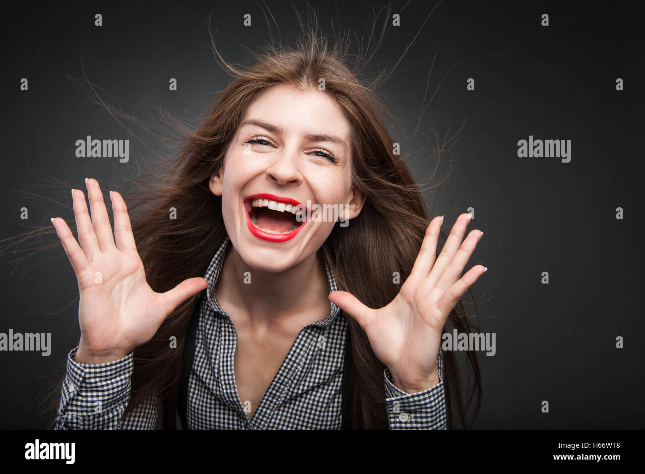 Beautiful women smiling with flying hair. Stock Photo