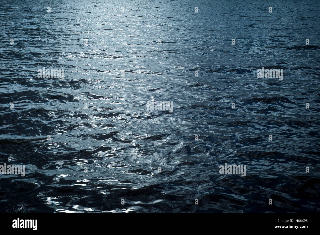 blue ocean with small waves and ripples Stock Photo
