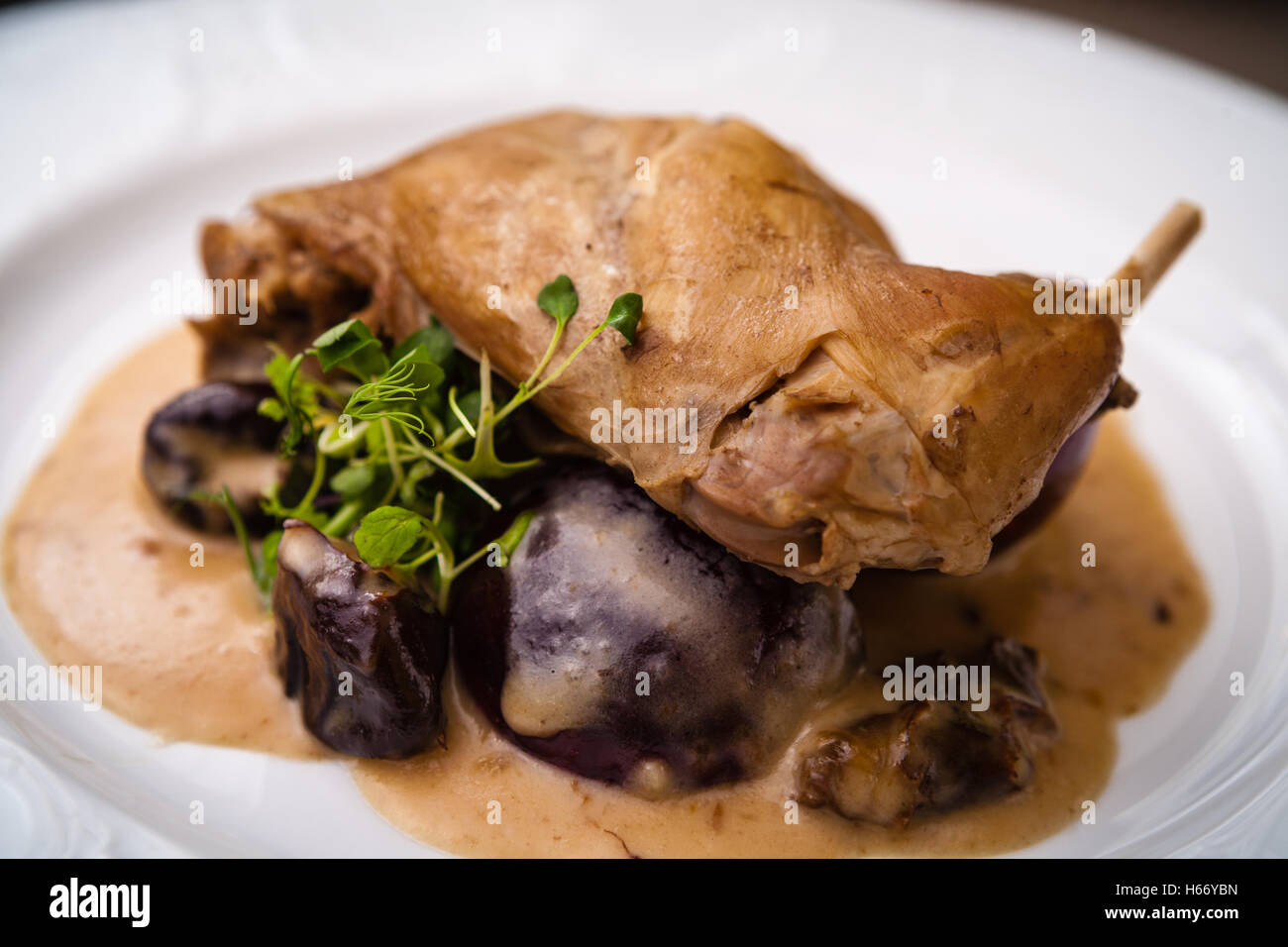 Stewed rabbit leg Stock Photo Alamy