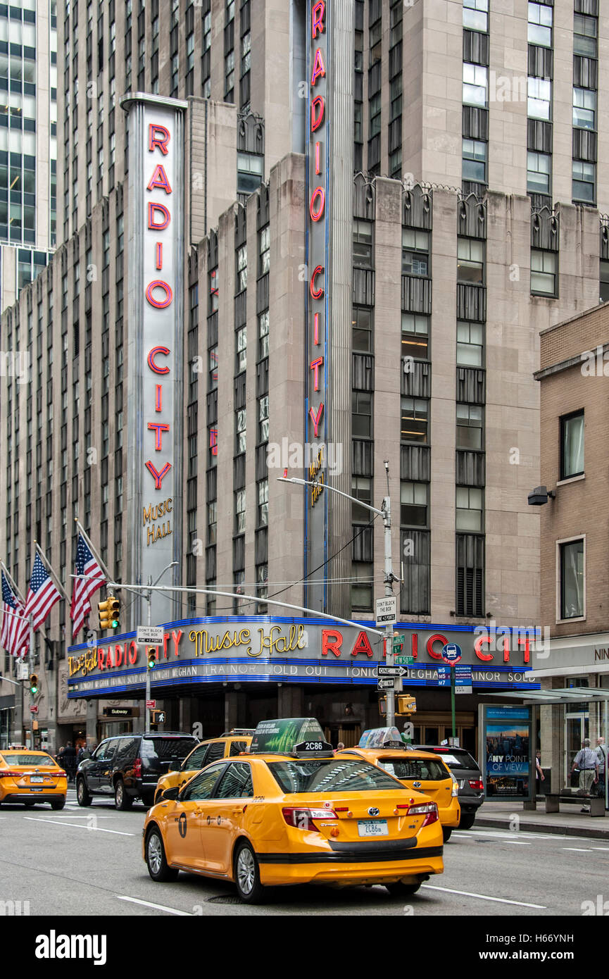 Radio City Music Hall on 6th Avenue at West 50th Street, with Taxis, Yellow Cabs, Manhattan, New York City Stock Photo