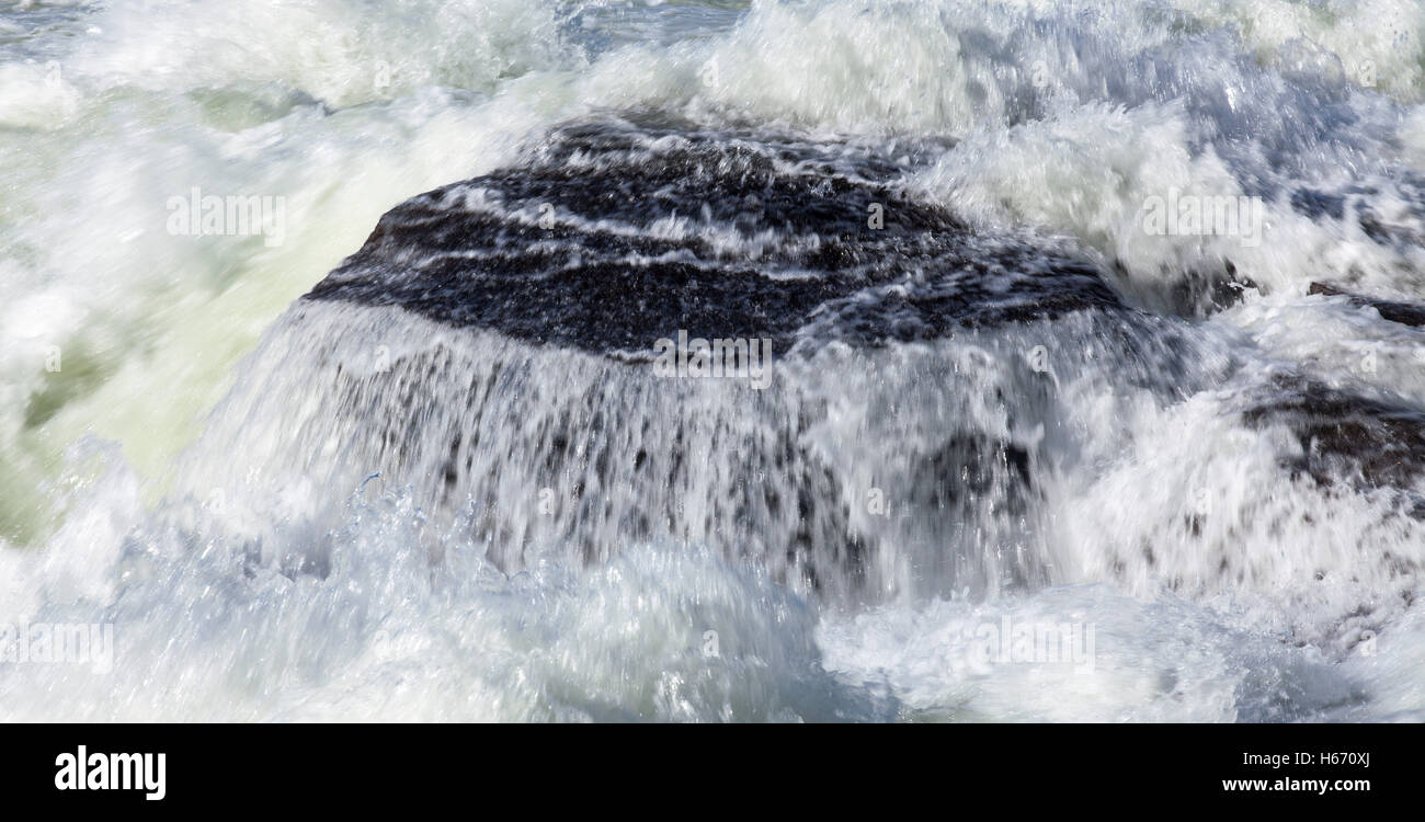 Waterfall in the mountain. Rocks and cliffs Stock Photo - Alamy