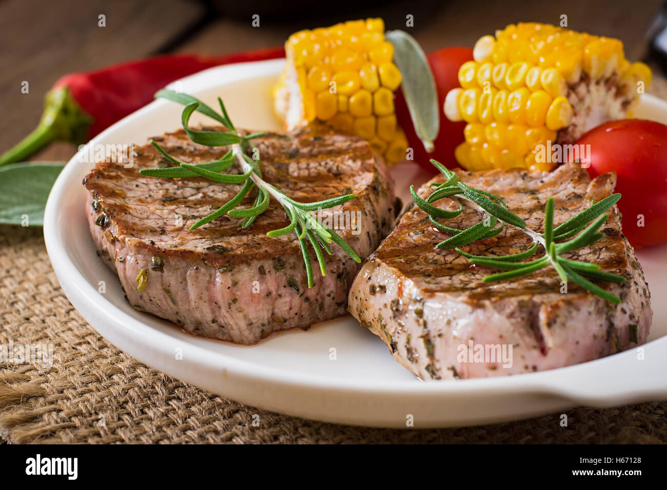 Tender and juicy veal steak medium rare with French fries Stock Photo -  Alamy