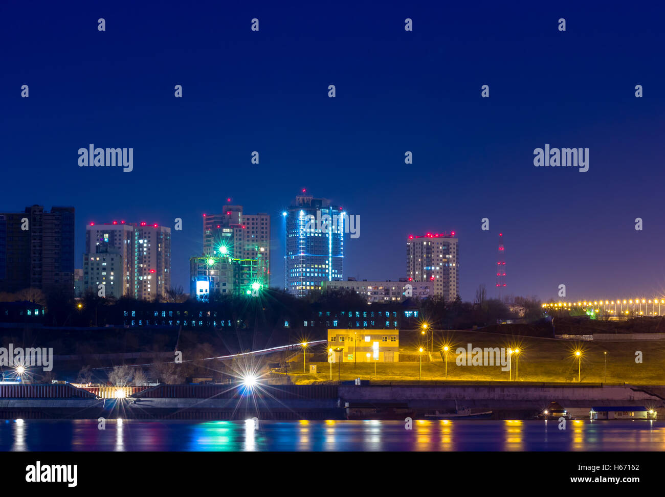 Reflection lights of the night city in a big river Stock Photo - Alamy