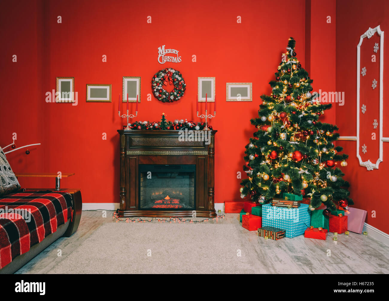 Defocused background Living room with christmas tree and fireplace Stock Photo