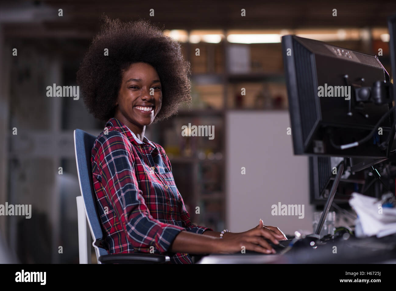 portrait of a young successful African American beautiful woman who ...