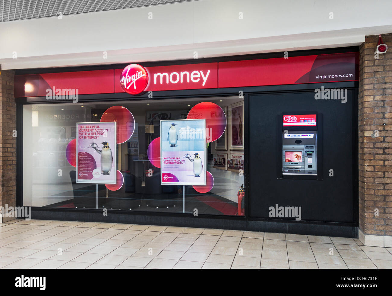 Virgin Money branch displaying logo and cash machine. Stock Photo