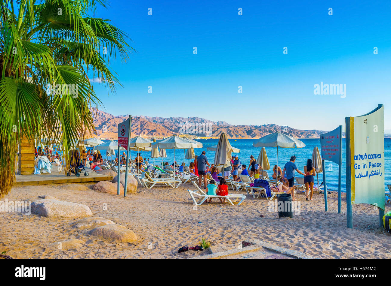 The afternoon time is the best time to relax on the beach, Eilat. Stock Photo