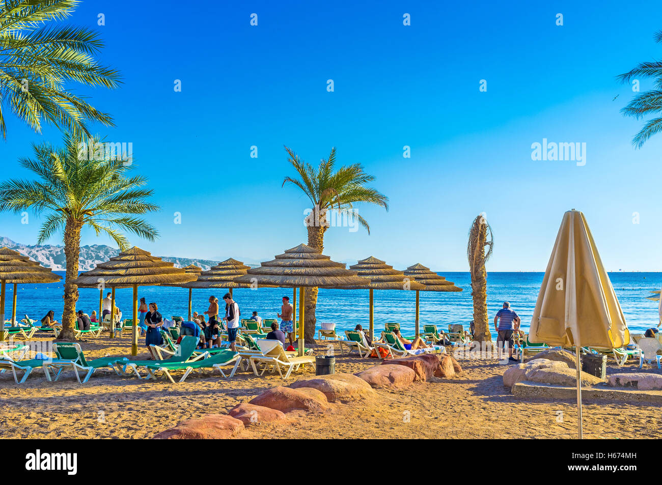 The best way to relax in Eilat is to visit local beach and to swim,  Eilat. Stock Photo