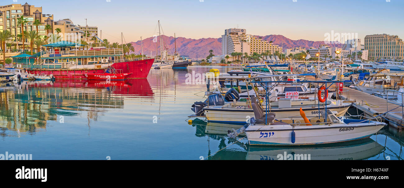 The sea trips and fishing are the most popular attractions in resort, so there are always many yachts in Lagoona, Eilat Stock Photo