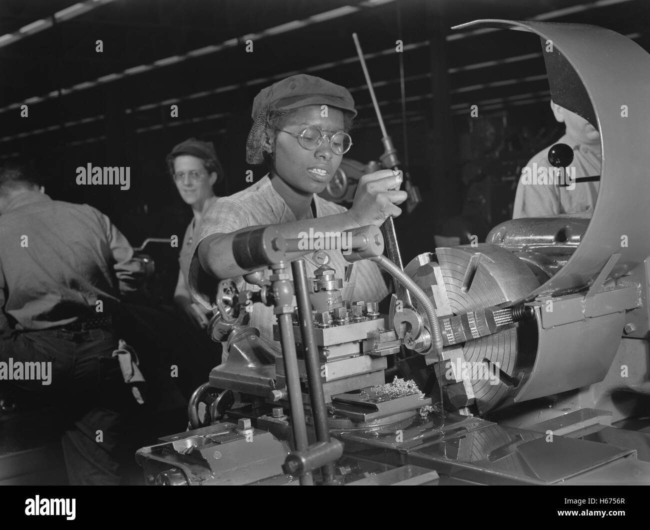 Female Lathe Operator at Aircraft Manufacturing Plant, Milwaukee, Wisconsin, USA, Ann Rosener for Office of War Information, October 1942 Stock Photo