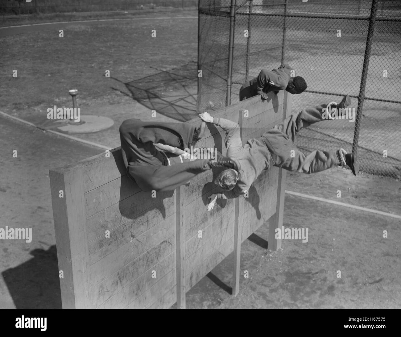 High School Victory Corps, Program Providing Training to Students Focusing on Skills Relevant to War Effort, Students on Obstacle Course, Flushing, New York, USA, William Perlitch, Office of War Information, October, 1942 Stock Photo