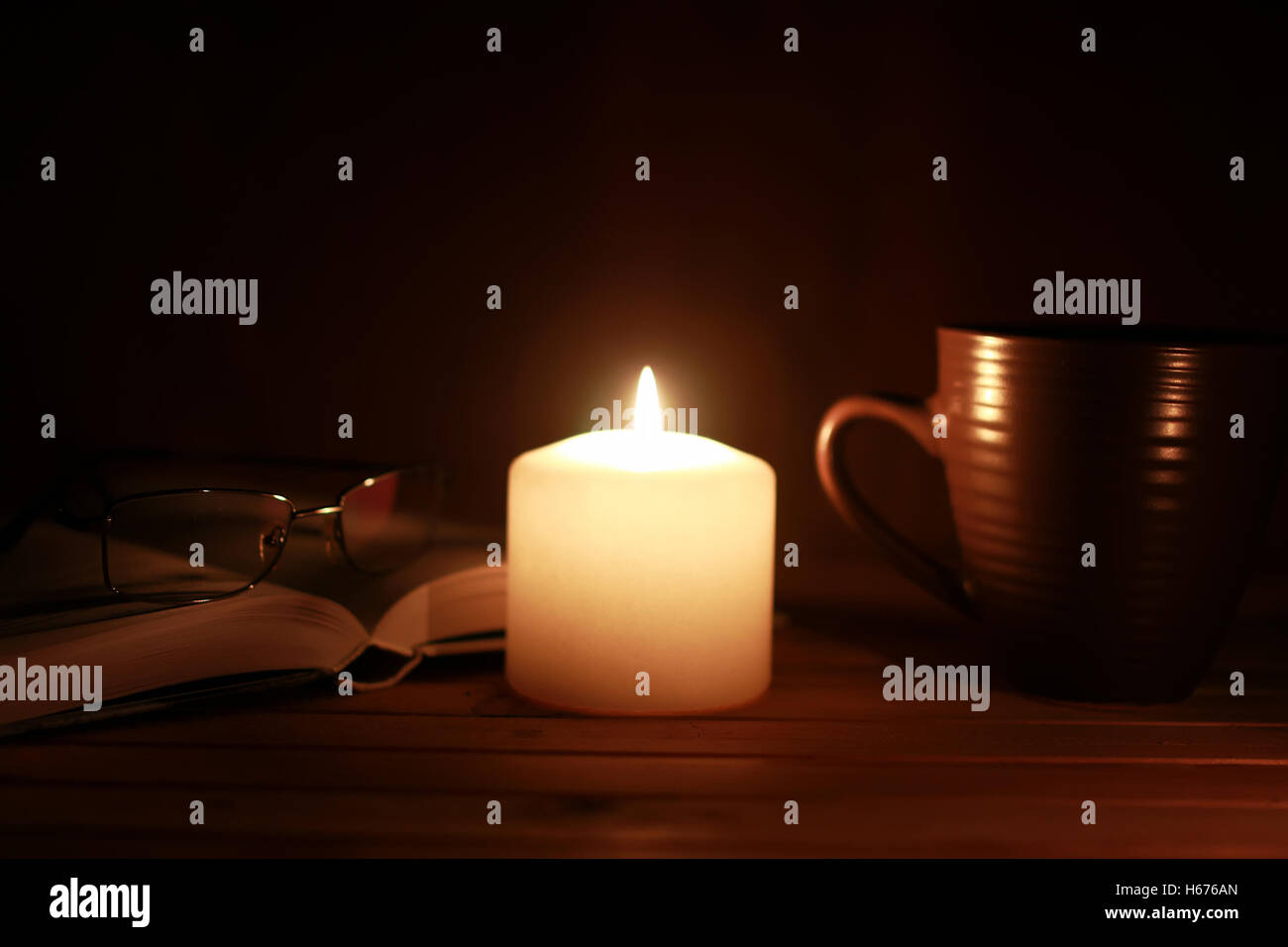 Reading By Candle Light Stock Photos & Reading By Candle Light Stock
