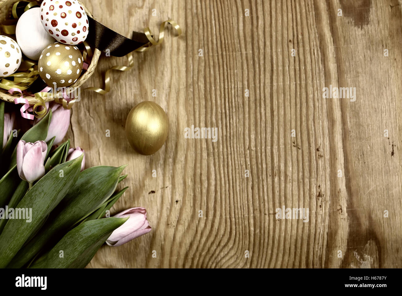 Toned background easter tulips and eggs Stock Photo - Alamy