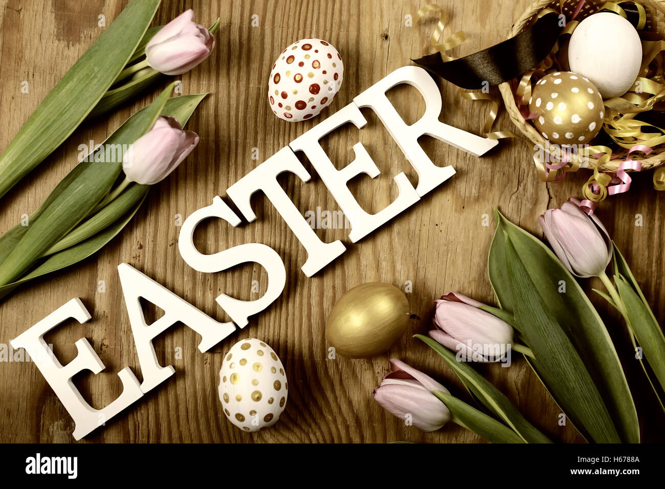 Toned background easter tulips and eggs Stock Photo - Alamy