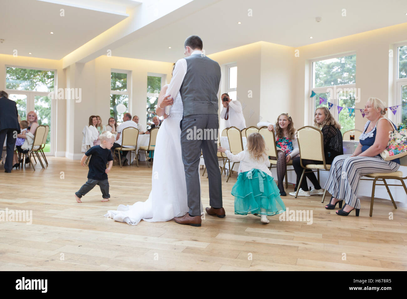 Bride and groom performing their first dance on their wedding day Stock Photo