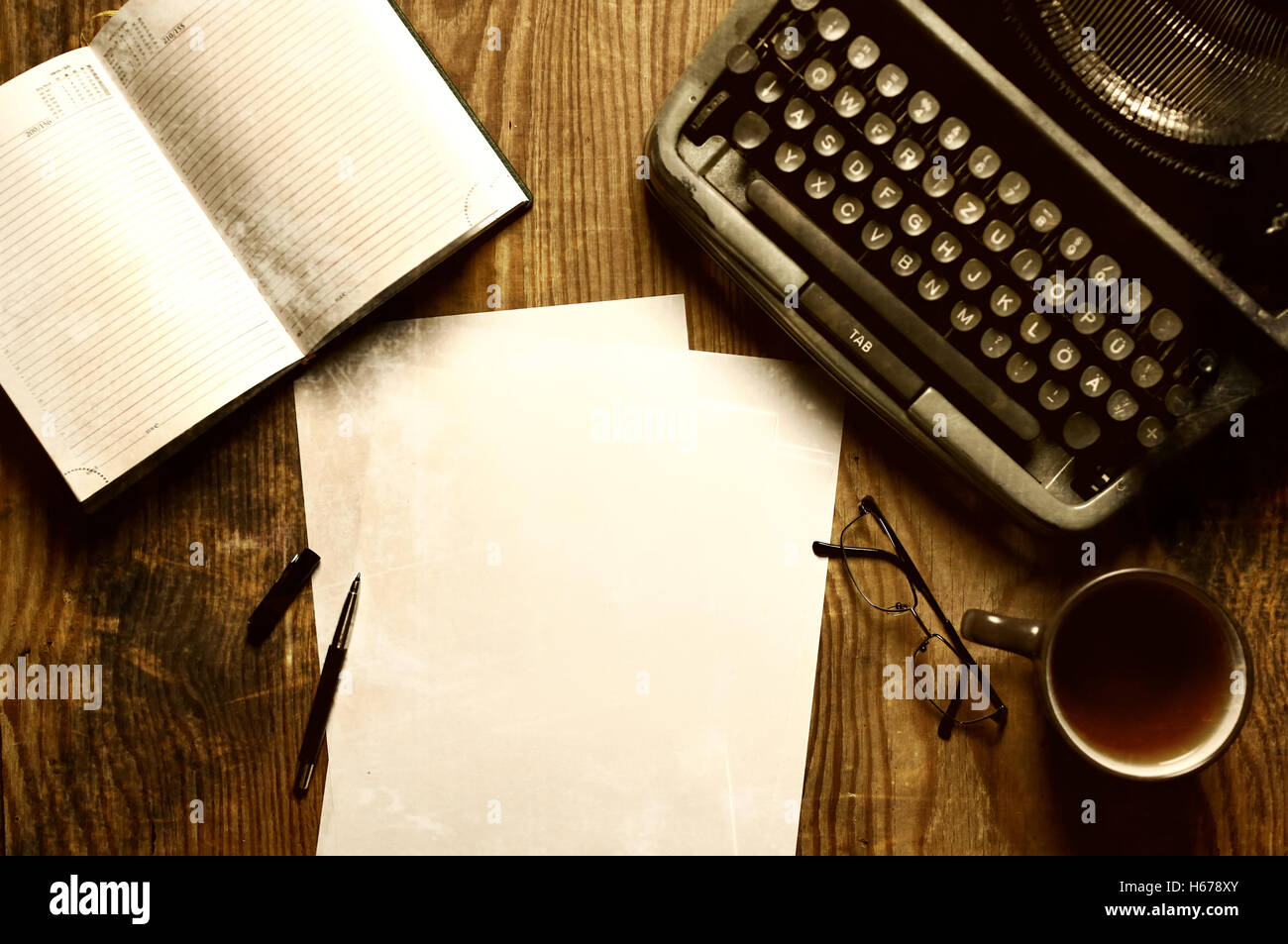 writer desktop with typewriter retro Stock Photo - Alamy