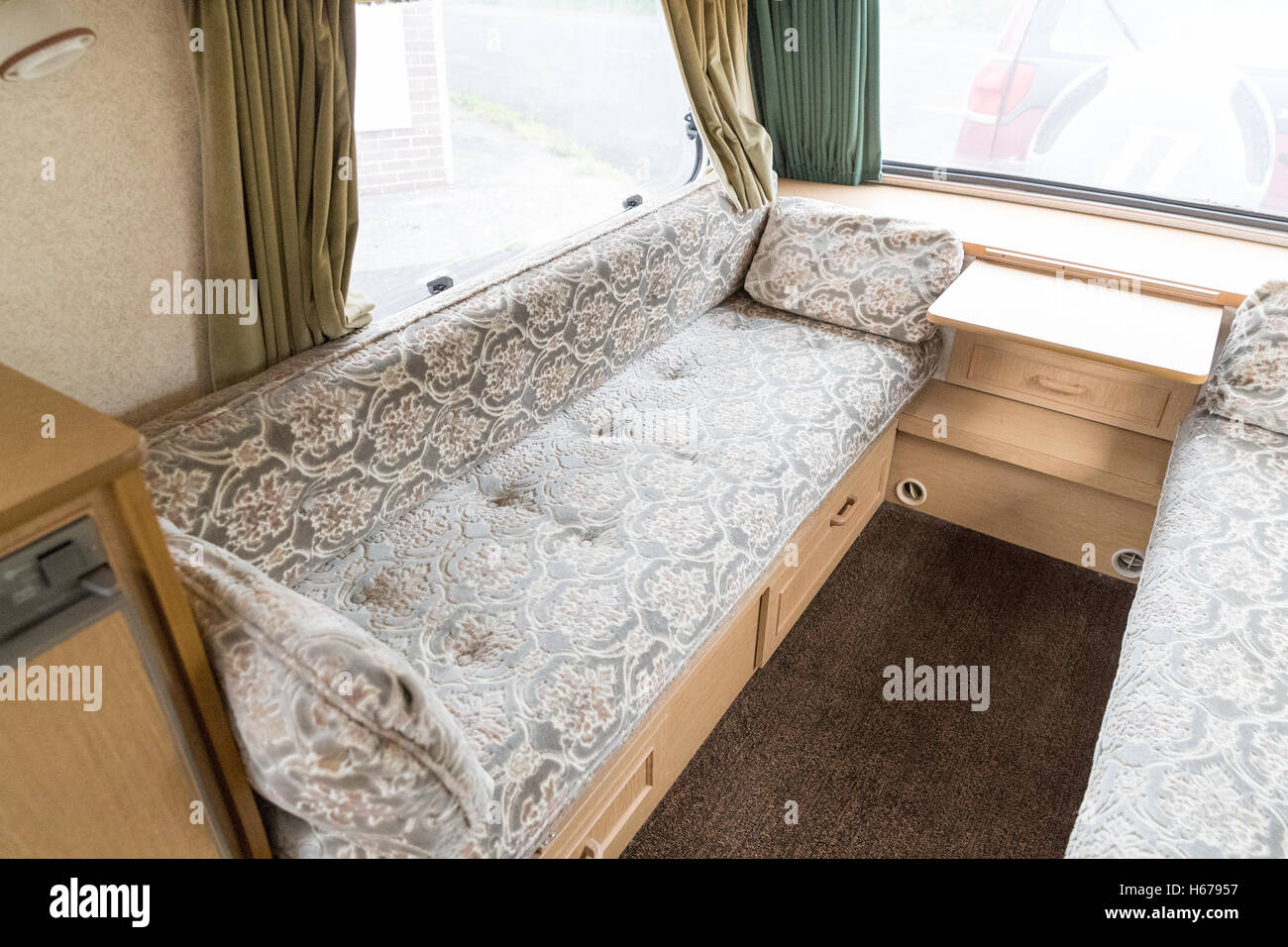 Interior of a caravan popular cheap family holiday home. Stock Photo