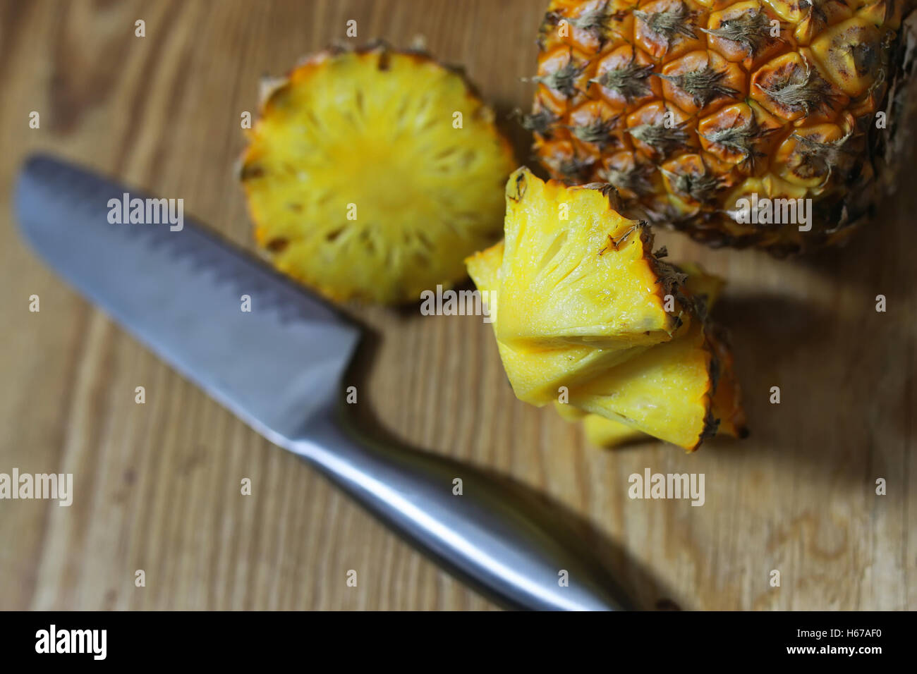 pineapple slices cut knife Stock Photo Alamy