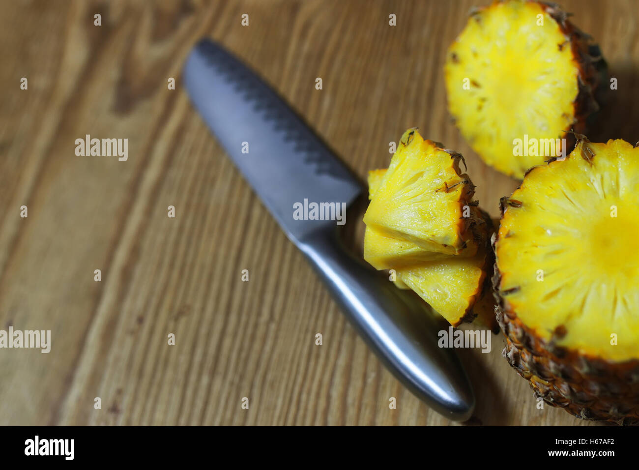 pineapple slices cut knife Stock Photo Alamy