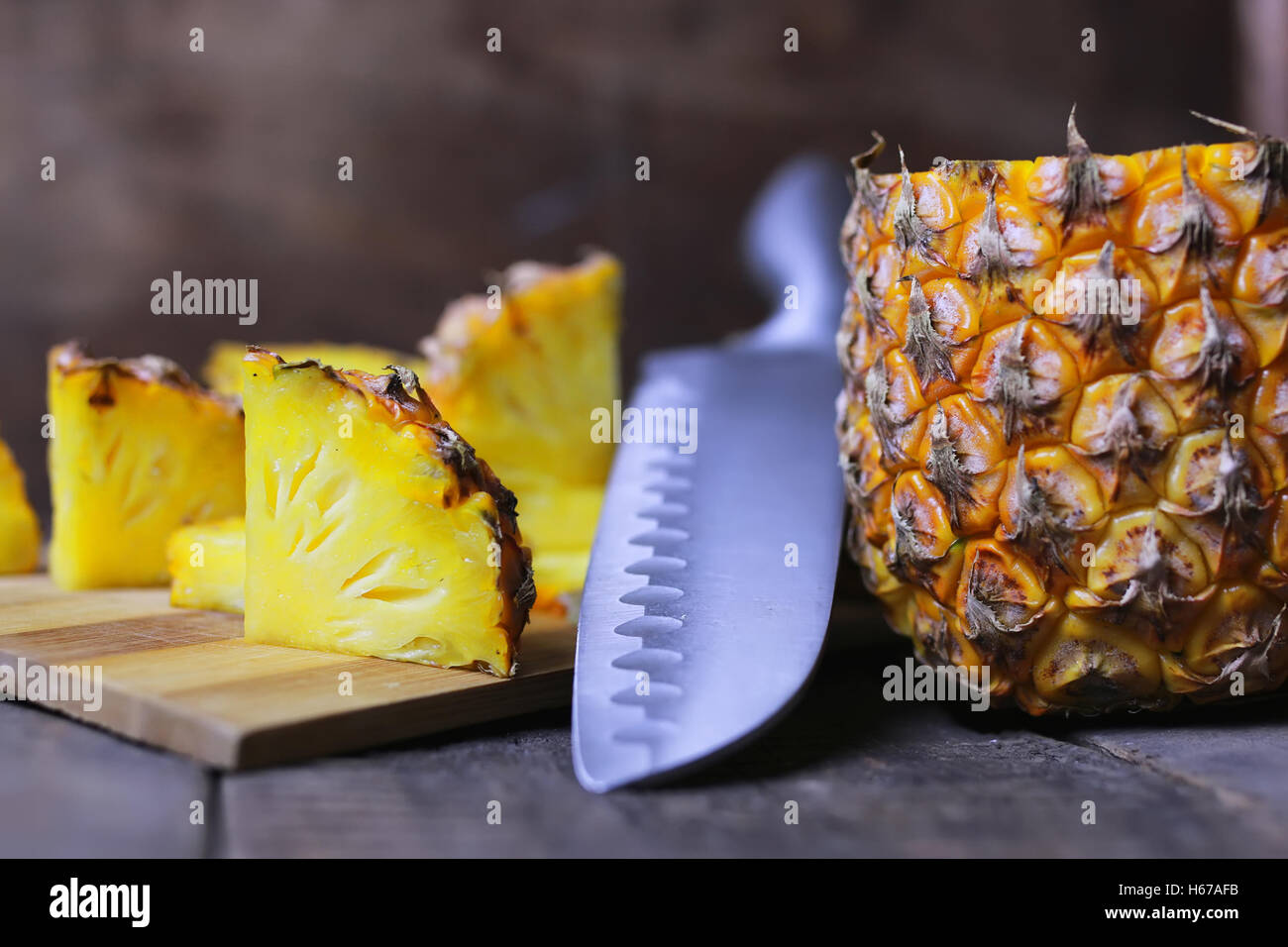 pineapple slices cut knife Stock Photo Alamy