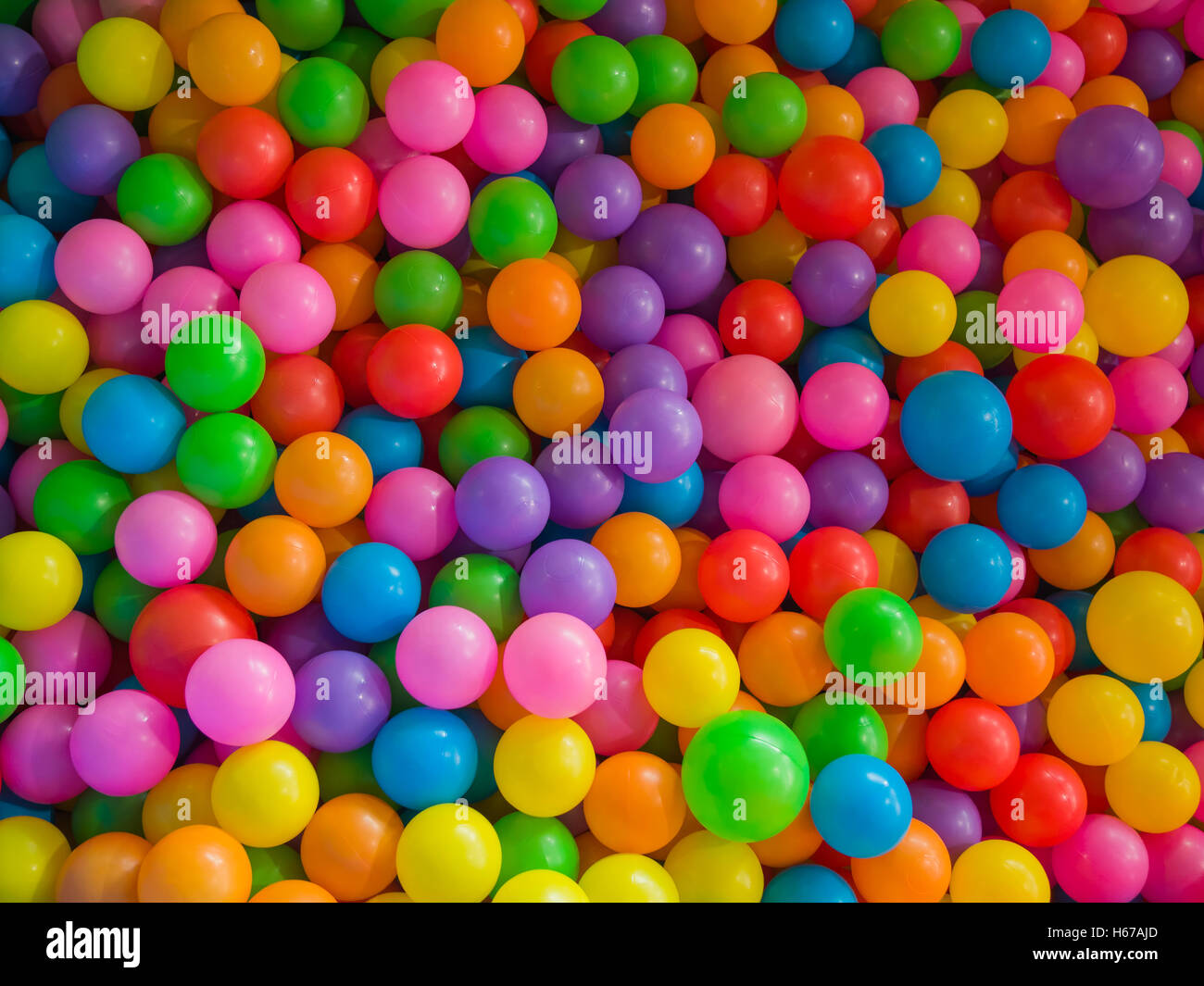 lots of colored plastic balls in a playground ball pool Stock Photo Alamy