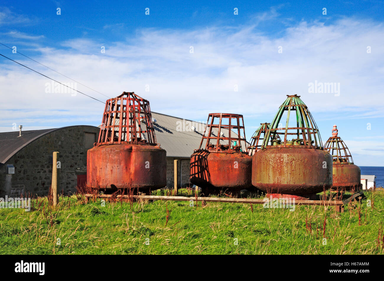 Old channel marker buoys stored at Kinnaird Head, Fraserburgh
