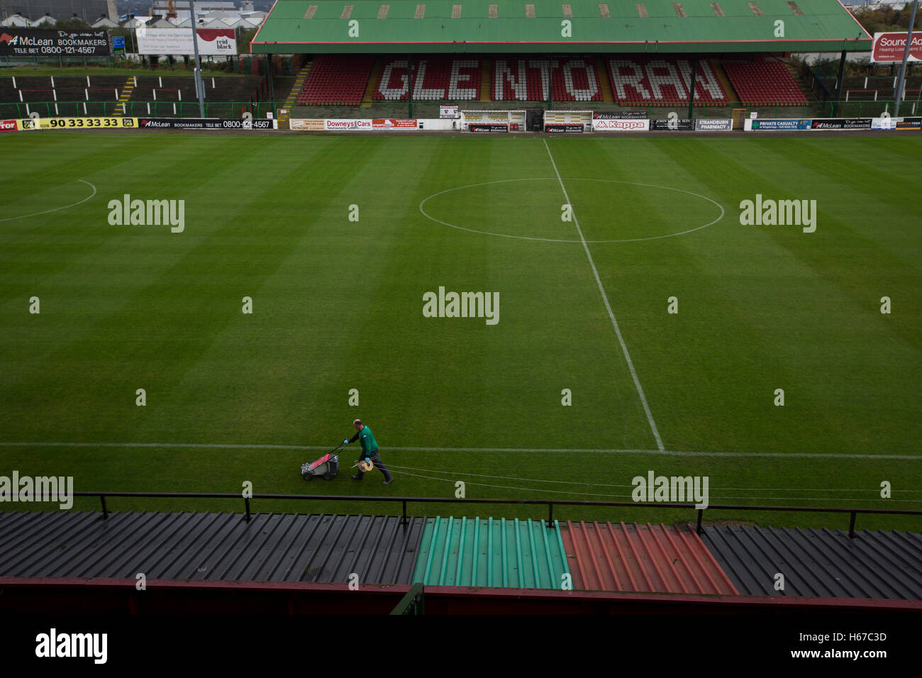 The club's groundsman lining the pitch at The Oval, Belfast, pictured