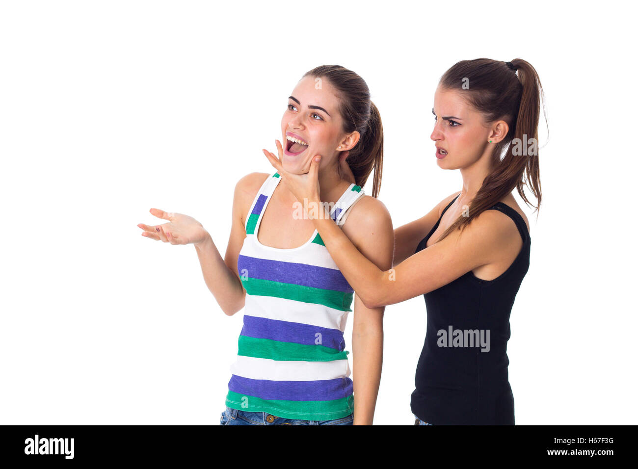 Young woman keeping another woman's throat Stock Photo