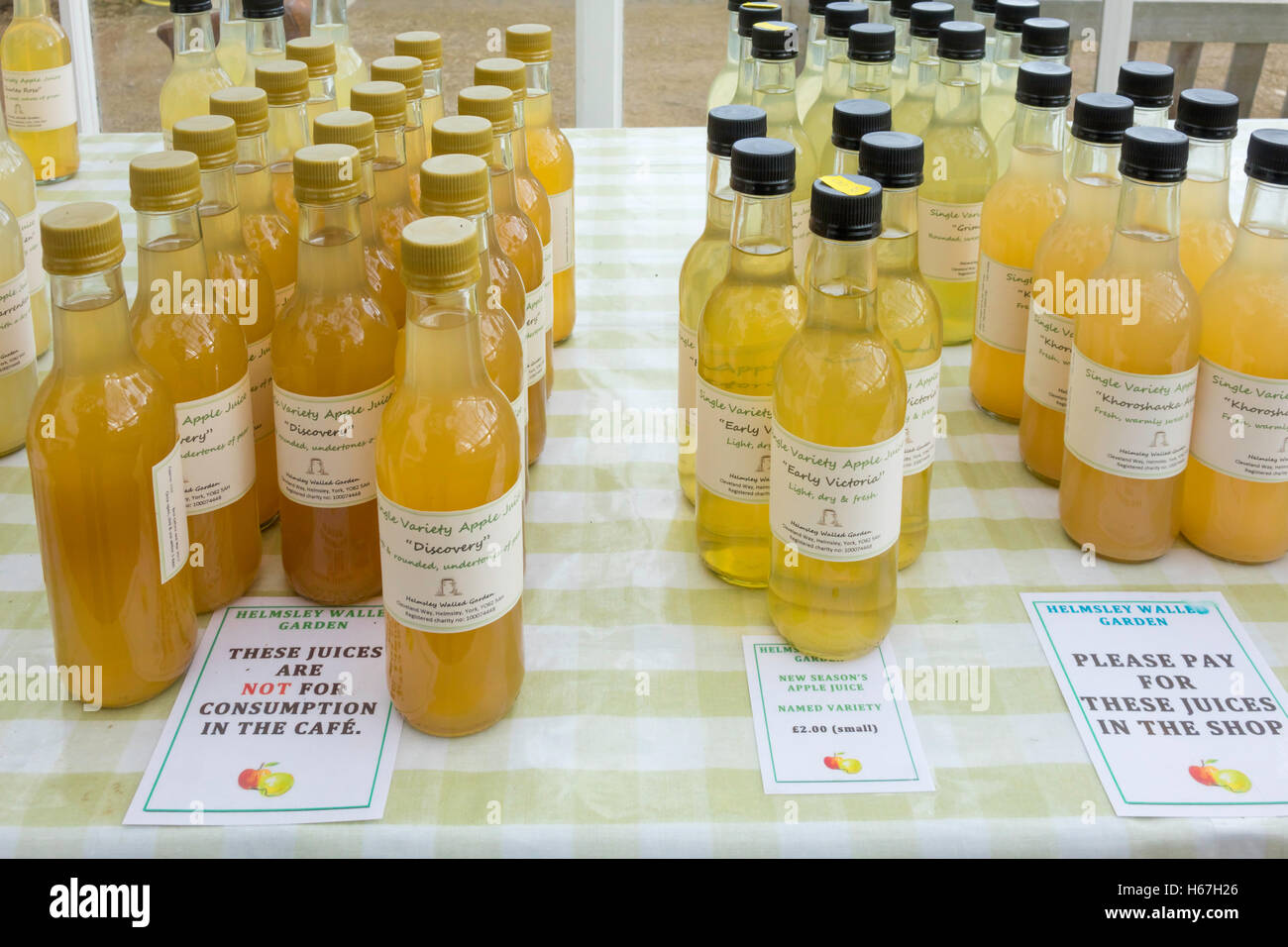 Bottled Apple Juice from named varieties of Apples grown pressed and bottled at the Helmsley Walled Garden North Yorkshire UK Stock Photo