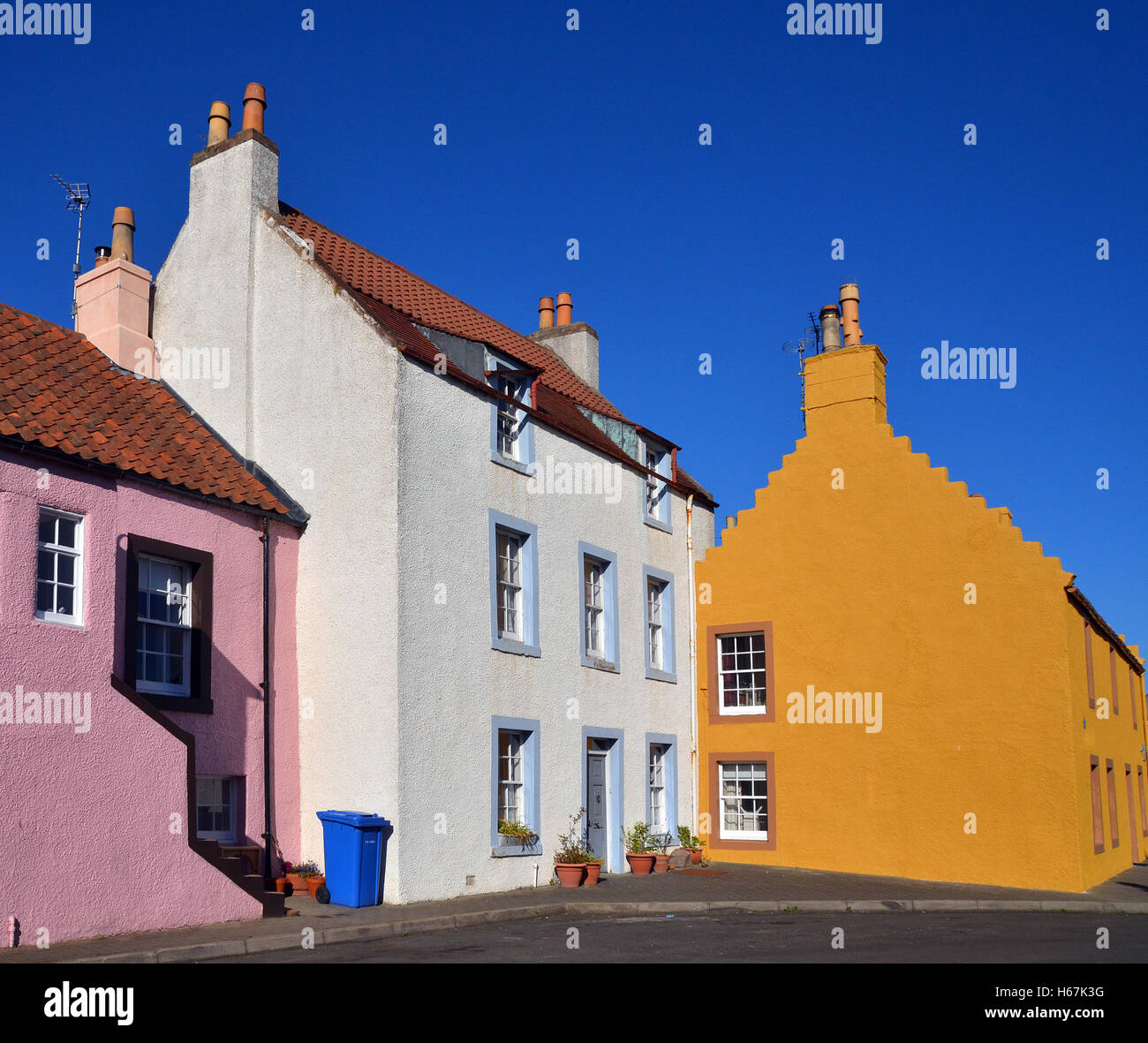 Brightly painted houses at the harbour of St.Monans, Fife,Scotland Stock Photo