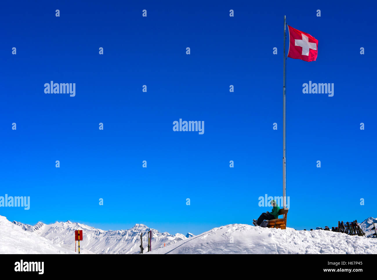Swiss flag at the viewpoint Moosfluh, Aletsch Arena region, Riederalp, Valais, Switzerland Stock Photo