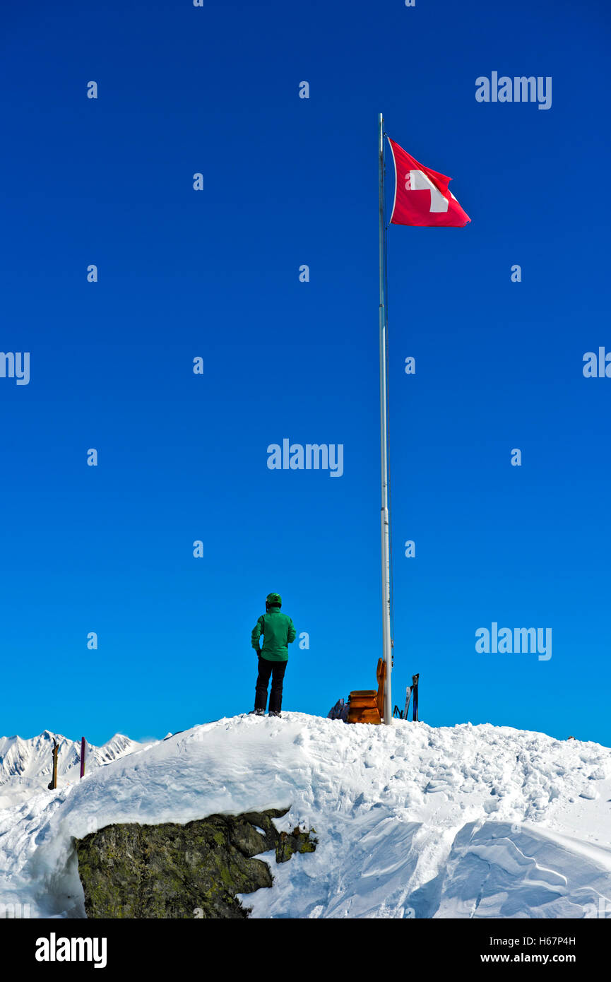 Swiss flag at the viewpoint Moosfluh, Aletsch Arena region, Riederalp, Valais, Switzerland Stock Photo