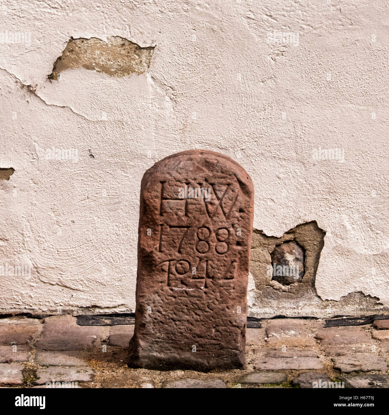 Old date stone in the Kellerei courtyard. Michelstadt, Southern Hesse, Germany Stock Photo