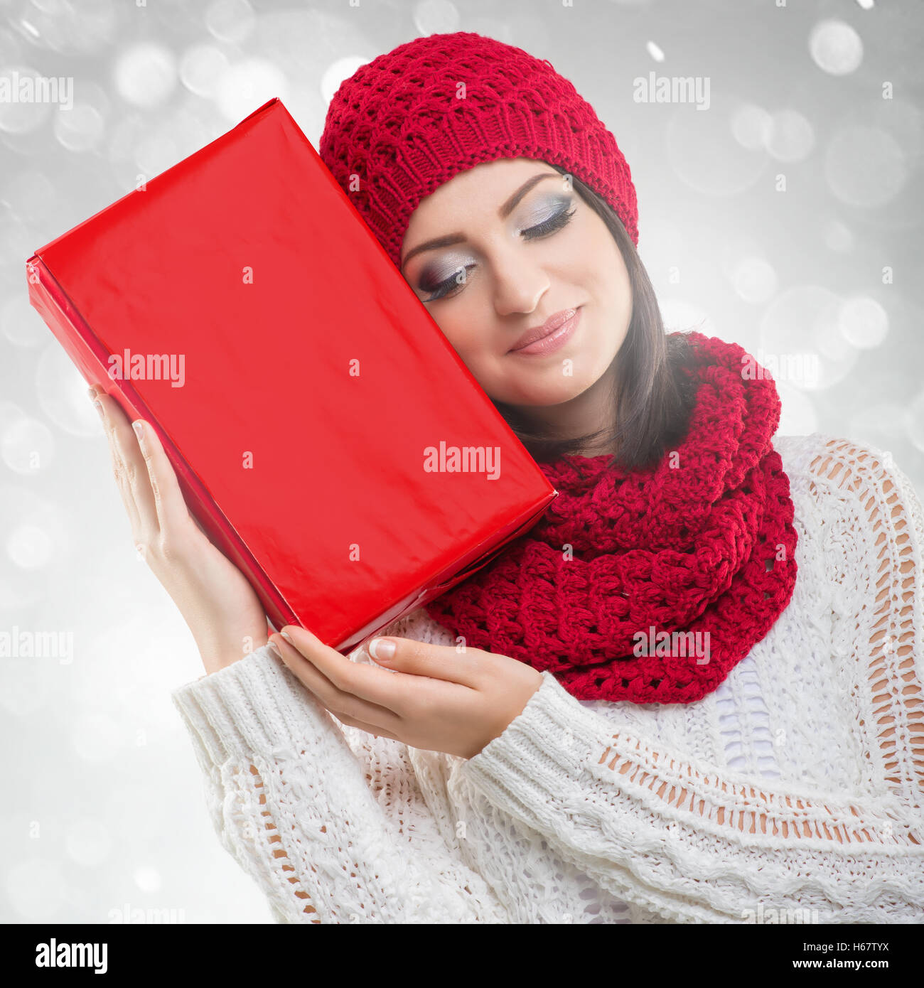 Santa Women, with red gift box Stock Photo