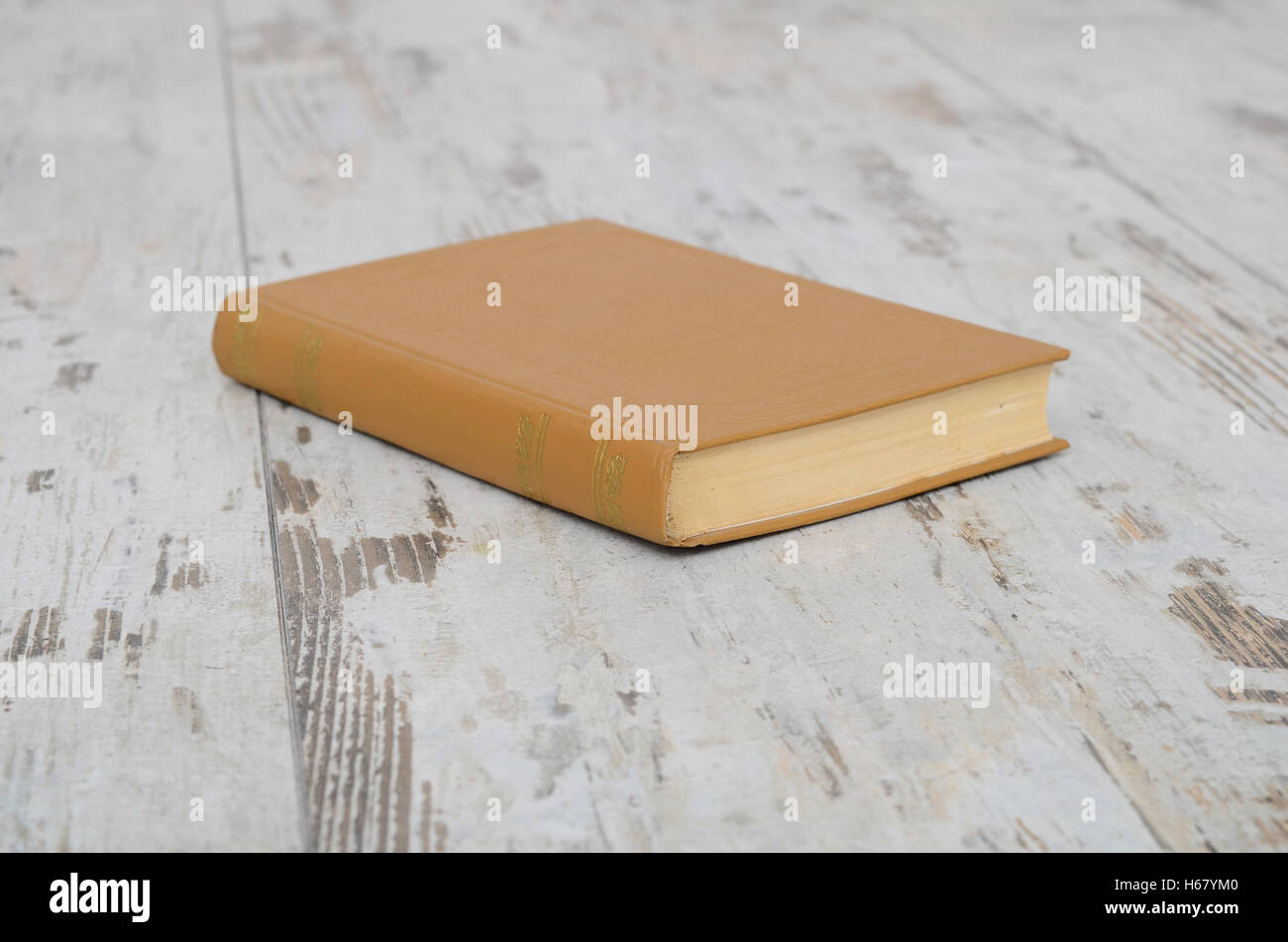 Lonely Book on the table object, texture, textbook Stock Photo - Alamy