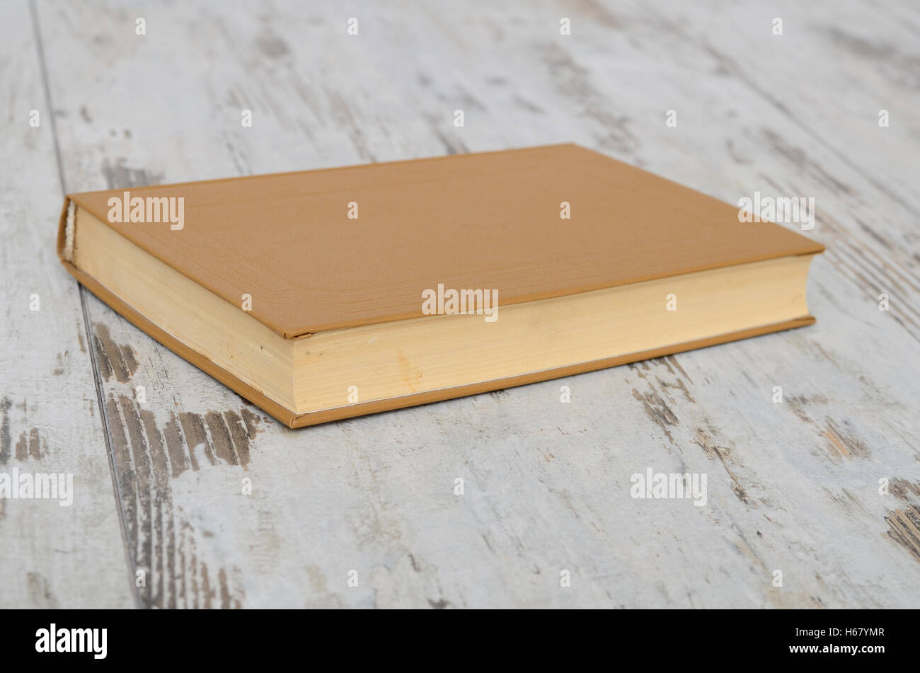 Lonely Book on the table object, texture, textbook Stock Photo - Alamy