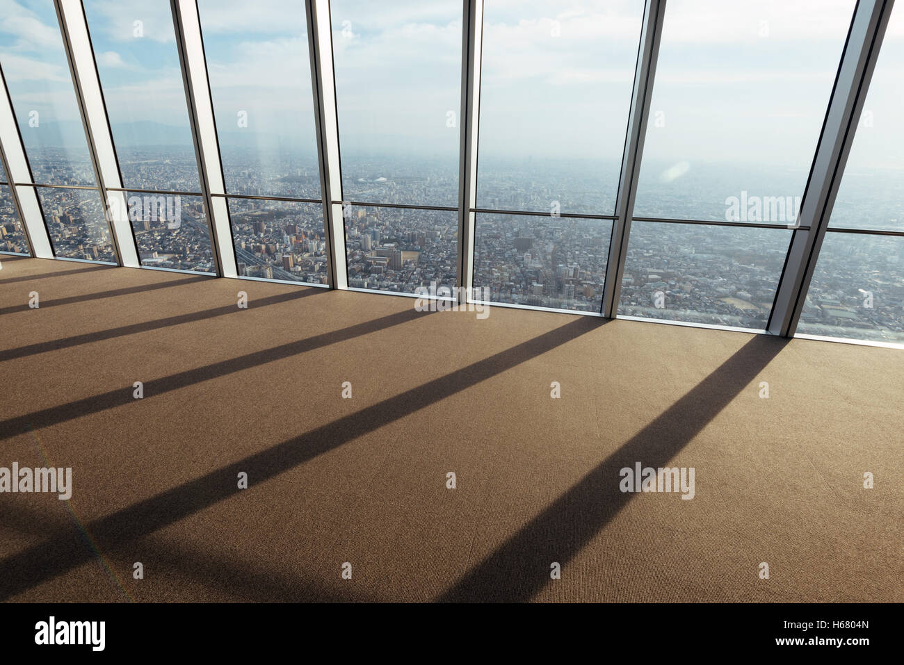 Backlit office room in a skyscraper. Stock Photo