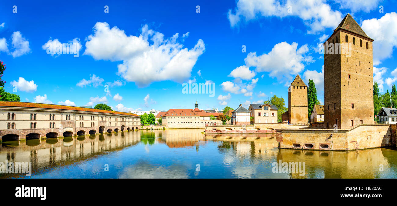 Strasbourg, towers of medieval bridge Ponts Couverts and reflection, Barrage Vauban. Alsace, France. Stock Photo