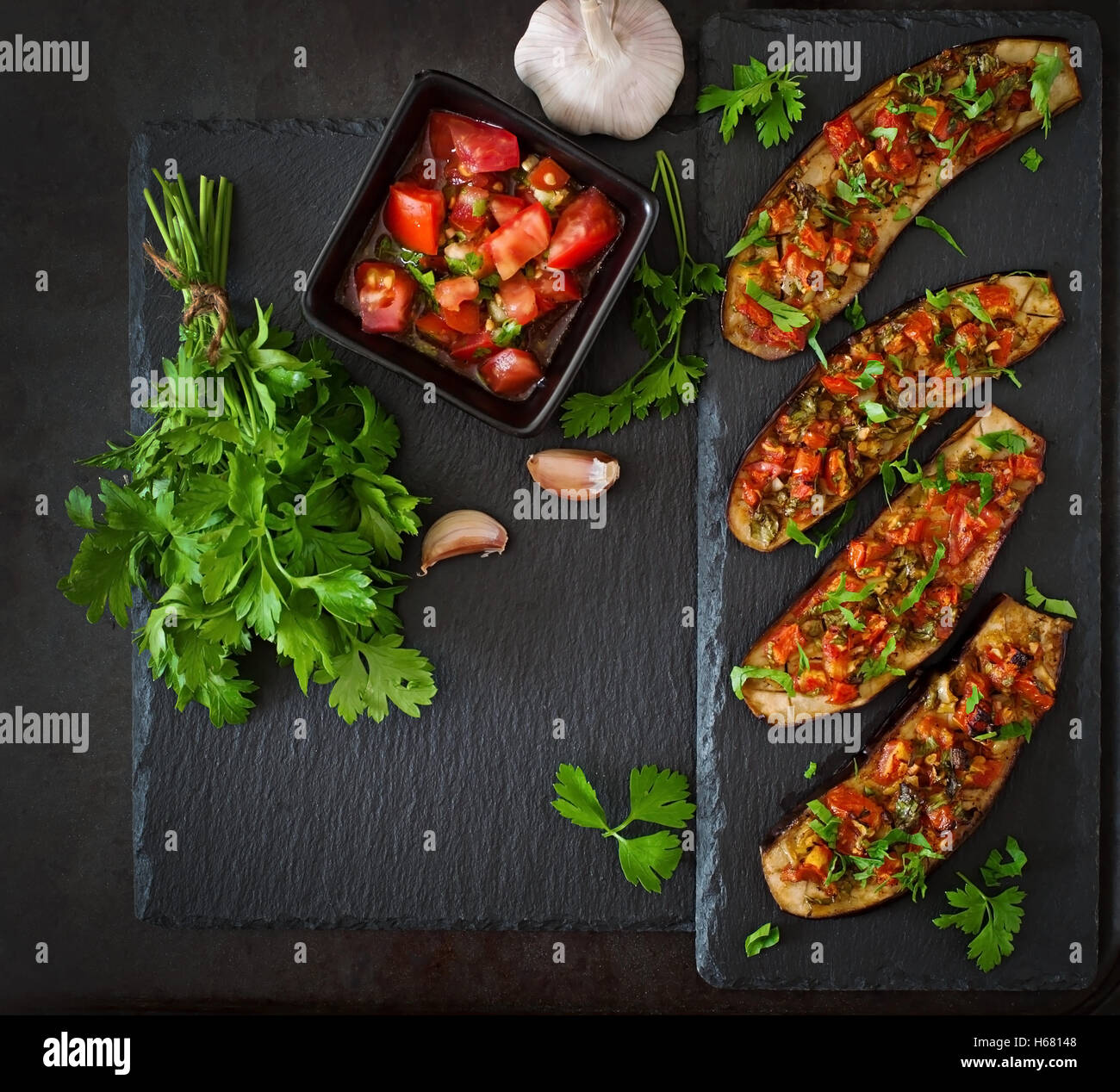 Baked eggplant with tomatoes, garlic and paprika Stock Photo Alamy