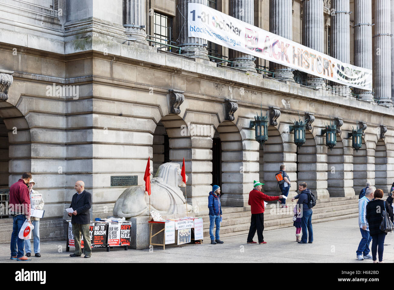 Activists handing out leaflets on behalf of Socialist Worker. In Nottingham, England. Stock Photo