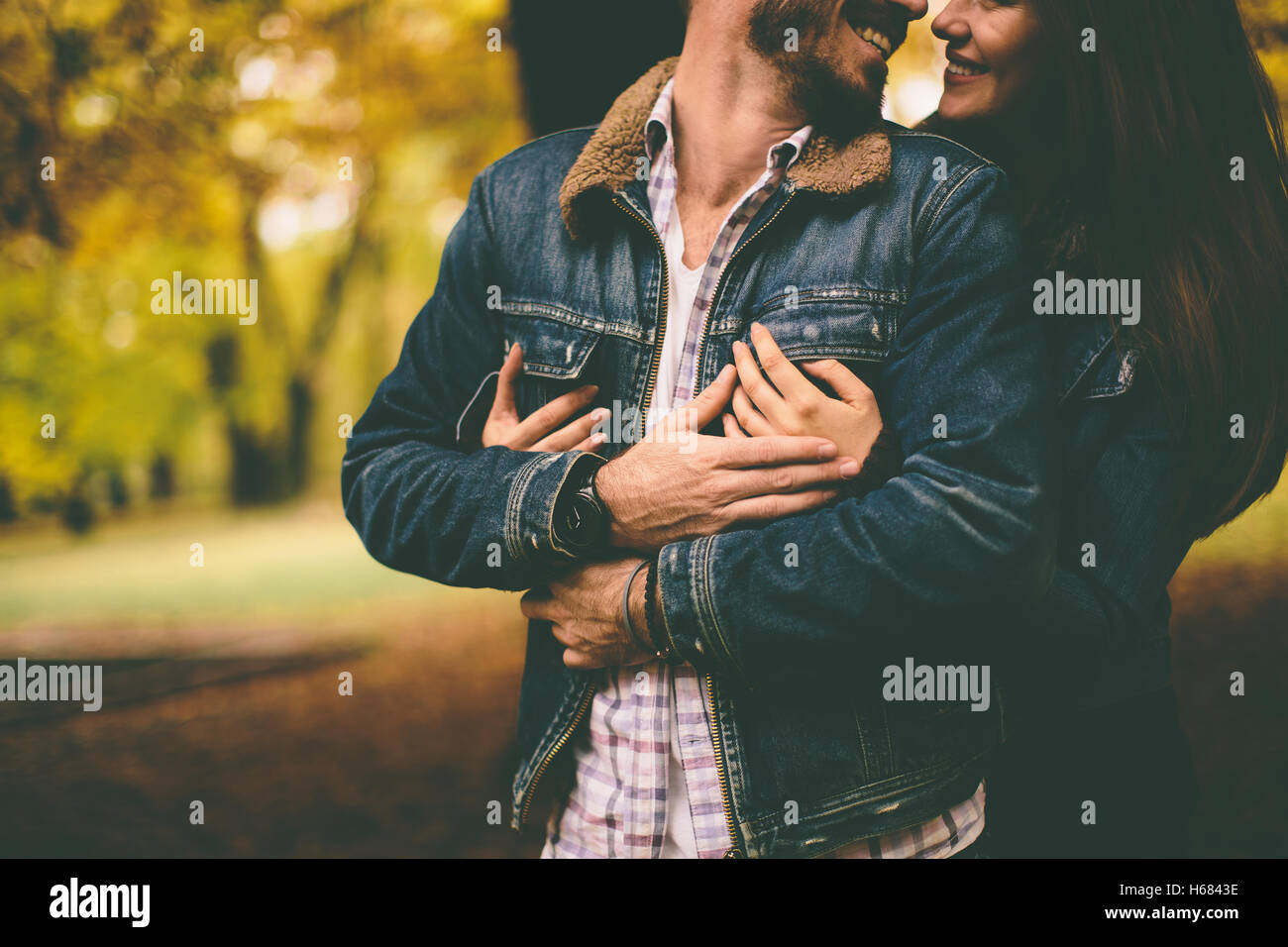 Loving couple in the autumn park Stock Photo - Alamy